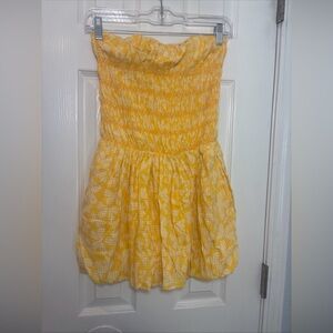 NWOT Free People strapless baby doll mini dress Yellow size XS.